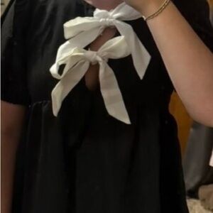 Black Dress with White Bow Accents